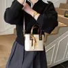 Bolso de Mano para Mujer 2026 Nuevo de Moda Nicho de Gama Alta Lujo Ligero Versátil Bolso de Hombro Exquisito Bolso Cruzado Tipo Cubo