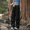 Pantalones Cortavientos Color Rojo Rosa Luotuo para Mujer Verano Estilo Delgado 2026 Nuevos Pantalones de Trabajo Americanos Senderismo al Aire Libre Secado Rápido Deporte Paraguas