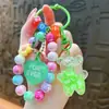 Llavero de oso con cuentas infundidas en aceite transfronterizo, botella de arena líquida, colgante de pulsera colorido, recuerdo, regalo pequeño, venta al por mayor de comercio exterior