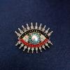 Broche Nuevo Retro Exagerado Ojo del Diablo Personalizado Abrigo de Mujer Aleación Incrustado con Perla de Agua Dulce Ramillete Accesorios de Traje