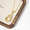 Nuevo Colgante de Calabaza de la Suerte Hueca Estilo Chino para Mujer, Modelo Nuevo con un Diseño Versátil y Elegante, Sensación de Alta Gama, Collar Tachonado de Diamantes, Cadena Ligera de Lujo para la Clavícula