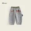 Moda Otoño 2025 Versátil Estilo Coreano Infantil Pantalones Bordados de Algodón Lavado para Niñas y Niños Pantalones Casuales