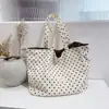 Bolsa de gran capacidad de verano para mujer, con un tejido de nailon de lunares de pana, una bolsa de mano versátil adecuada para la escuela, el trabajo y el uso diario