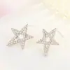 Elegantes pendientes de lujo de alta gama con forma de estrella asimétrica de cinco puntas, pendientes creativos de estrella con circonita brillante