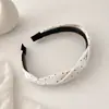 Diadema retorcida de lunares suave para coronilla alta, diadema versátil para uso diario para mujer, nuevo modelo 2026, accesorio externo para el cabello