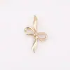Broche de metal de cinta de pajarita, prendedor de corsage vintage de moda, accesorio para la ropa, pasador antideslizante