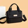 Bolsas de Moda para Mujer al por Mayor 2026 Nuevo Bolso de Mano Ligero de Tela de Nylon Bolso de Hombro Casual para Viaje Cruzado Bolso Pequeño de Moda