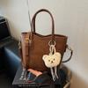 Bolso de Mano Retro de Diseño Nicho Coreano Transfronterizo para Mujer Otoño 2026 Nueva Moda Bolso Cruzado Cubo Versátil