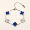 Tallado láser moda temperamento flor de cuatro hojas láser oro lote flor pulsera clavícula mujer 2025 sentido del diseño no se decolora