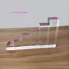 Coluna quadrada de acrílico de alta transparência com base de cristal para exibir cosméticos, joias e outros itens decorativos.