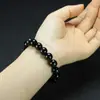 Pulseira de Obsidiana Natural, Moderna e Versátil para Homens e Mulheres, Atacado Cordão de Contas Redondas Pulseira de Obsidiana Prateada Joias