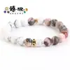 TEMU estilo explosivo transfronteiriço pedra natural pedra de pinho pulseira de contas bicolor moda simples alta qualidade versátil cordão de mão atacado