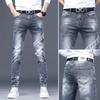 Pantalones vaqueros gruesos con forro polar para hombre, marca de moda europea, elásticos, ajustados, con estampado distintivo, negros, largos y modernos.