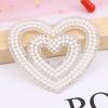 Zhao Shun Love - Parche de perforación en caliente con forma de corazón y perla, adhesivo termofusible para tela inferior, decoración de agujeros para zapatos y sombreros, venta al por mayor