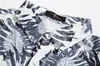 Camisa floral de playa estilo isla de Hainan, ropa unisex para parejas, vacaciones de viaje, sensación relajada, manga corta, Malasia