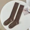 Calcetines de cachemir de otoño e invierno para mujer, calcetines de pantorrilla con giro retro japonés, calcetines de pelo largo de color liso, calcetines versátiles de moda coreana para mujer