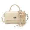 Bolso pequeño texturizado de alta calidad al por mayor para mujer, nuevo modelo de verano 2026, bolso de hombro con hebilla de cierre simple, bolso cruzado para el trabajo