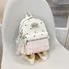 Fofo, doce, fresco, de grande capacidade, nova tendência de moda outono de 2026, simples e versátil, mochila de viagem leve