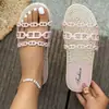 Sandalias casuales para mujer con diseño europeo y americano, nuevo modelo elegante de verano con decoración de cadena y suela tejida, chanclas de playa de una correa