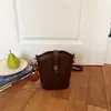 Bolso cubo de alta gama con temperamento cruzado, bolso de mano de tendencia retro coreana, bolso simple versátil para el trabajo, de un solo hombro, cruzado