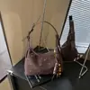 Bolso Vintage con Remaches Transfronterizo para Mujer, Nuevo Bolso Cruzado Casual de Nicho Otoño/Invierno 2026, Bolso de Hombro Único tipo Dumpling
