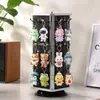 Estante de exhibición de tablero perforado negro multifuncional de cuatro caras de fábrica, con bordes espejados, giratorio, para supermercados y tiendas departamentales, al por mayor