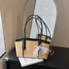 Bolsa de Palha Tecida Estilo Simples Transfronteiriça Feminina Verão 2026 Nova Grande Capacidade Elegante Estilo Férias Bolsa de Ombro Único Subarmário