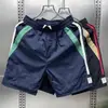 Verano 2026 Nuevo Estilo Japonés Simple Color Sólido Secado Rápido Pantalones Cortos Finos para Hombre Casual Cintura Elástica Holgados de Cinco Puntos