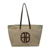 Bolso tote de hombro único para el día a día 2026 nuevo casual simple gran capacidad bolso de axila retro nicho bolsa de lona