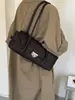 Bolso de axila de alta gama transfronterizo para mujer, nuevo modelo de moda versátil retro para el otoño de 2026, bolso de mano de lujo ligero