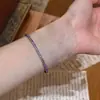 Diseño morado con piedras trituradas y cuentas de diamantes brillantes, un estilo único de lujo ligero con una sensación de alta gama, pulsera transfronteriza absolutamente hermosa