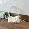 Bolsa de ombro/axila simples de cor sólida estilo coreano, nicho, para mulheres, novo modelo de verão 2026, bolsa transversal moderna para trabalho e deslocamento