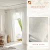 Nuevo estilo de cortinas translúcidas con patrón de ondas de agua, que ofrecen privacidad mientras permiten el paso de la luz, adecuadas para salas de estar y balcones, proporcionando protección solar y disponibles en diseños personalizados.