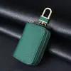 Estuche para llaves de cuero genuino: Protección de doble capa, diseño minimalista en negro y marrón. ¡Duradero y Elegante!