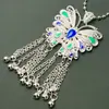 Accesorios de imán para refrigerador de la etnia Miao, piezas estilo chino de fénix y mariposa imitación plata, estilo étnico de plata Miao de nicho, pavo real, área escénica de Guizhou
