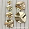 Botones metálicos texturizados con volantes para trajes, abrigos de lana tejidos, botones decorativos simples y versátiles cosidos a mano