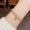 Nuevo Pulsera de Oro de 14K Estilo Ins de Amazon Pulsera de Zirconia Cadena de Perlas Millet Pulsera de Tres Piezas Tendencia Elegante