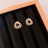 "Abalorio Floral de Perla" aretes de botón florales vintage con circonita y perla, aretes de lujo ligero de alta gama con un diseño único, aretes de nicho