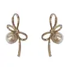 Celebridad de Internet Caliente Ins Gama Alta Dulce Lazo Perla Hebilla Oreja Suave Elegante Moda Lujo Ligero Versátil Pendientes