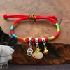 Festival del Bote del Dragón zongzi pulsera tejida a mano estilo nacional cuerda roja cuerda colorida aleación conejo pulsera de mano pequeños regalos al por mayor