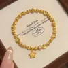 Pulseira Estrela Disco com Contas Marteladas Olho de Gato Banhada a Ouro Brilhante para Mulheres com Anel Corrente Correndo Cravejado de Diamantes e Fio Elástico