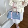 Bolso de mano retro de gran capacidad transfronterizo para mujer, nuevo bolso de moda simple para mujer, bolso de hombro para el antebrazo para el trabajo para mujer