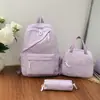 Mochila casual de gran capacidad nueva para estudiantes de primaria, secundaria y preparatoria, mochila de viaje de color liso simple de moda estilo japonés