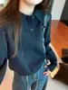 Tejido de hilo de núcleo, cuello polo estilo coreano engrosado, suéter de punto de corte relajado para mujer, top holgado y estilizado