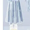2026 Conjunto de Saia com Patchwork Xadrez Fresco de Manga Curta com Laço Fofo para Crianças Médias e Grandes Conjunto de Duas Peças de Verão Dopamina