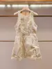 Shenzhen Nanyou Moda Femenina de Gama Alta Verano Nuevo Estilo Francés Chic y Elegante Diseño de Nicho Vestido sin Mangas Calado
