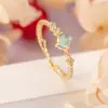 Diseño de Oro de 14K Granate Natural Vidrio de Alto Hielo Anillo Joker de Lujo Ligero Simple y Exquisito