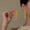 Hija de familia rica ~ aretes de trigo con borla larga dorada para mujer, aretes de lujo ligero de alta gama, aretes de atmósfera exagerada única