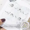 Paquete de material para manicura 2024 primavera y verano nuevo estilo mono mismo estilo hacha Corazón Torcido Cristal K9 diamante flash manicura al por mayor