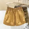 Pantalones casuales holgados blancos de cintura alta son adecuados para mujeres de mediana edad y mayores, ofreciendo un diseño cómodo y elegante